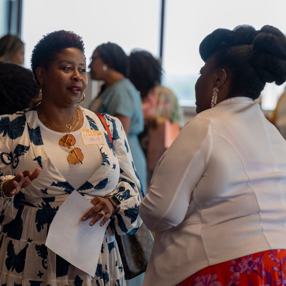 women networking at event image
